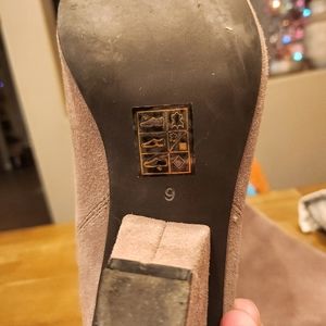 Calf high leather heeled boots